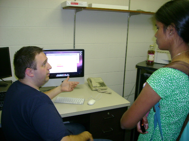 MASL researcher John Spencer leads a discussion on iPhone development at a weekly group meeting.